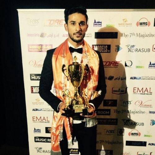 Dileep R Shetty with trophy of Mr. Dubai