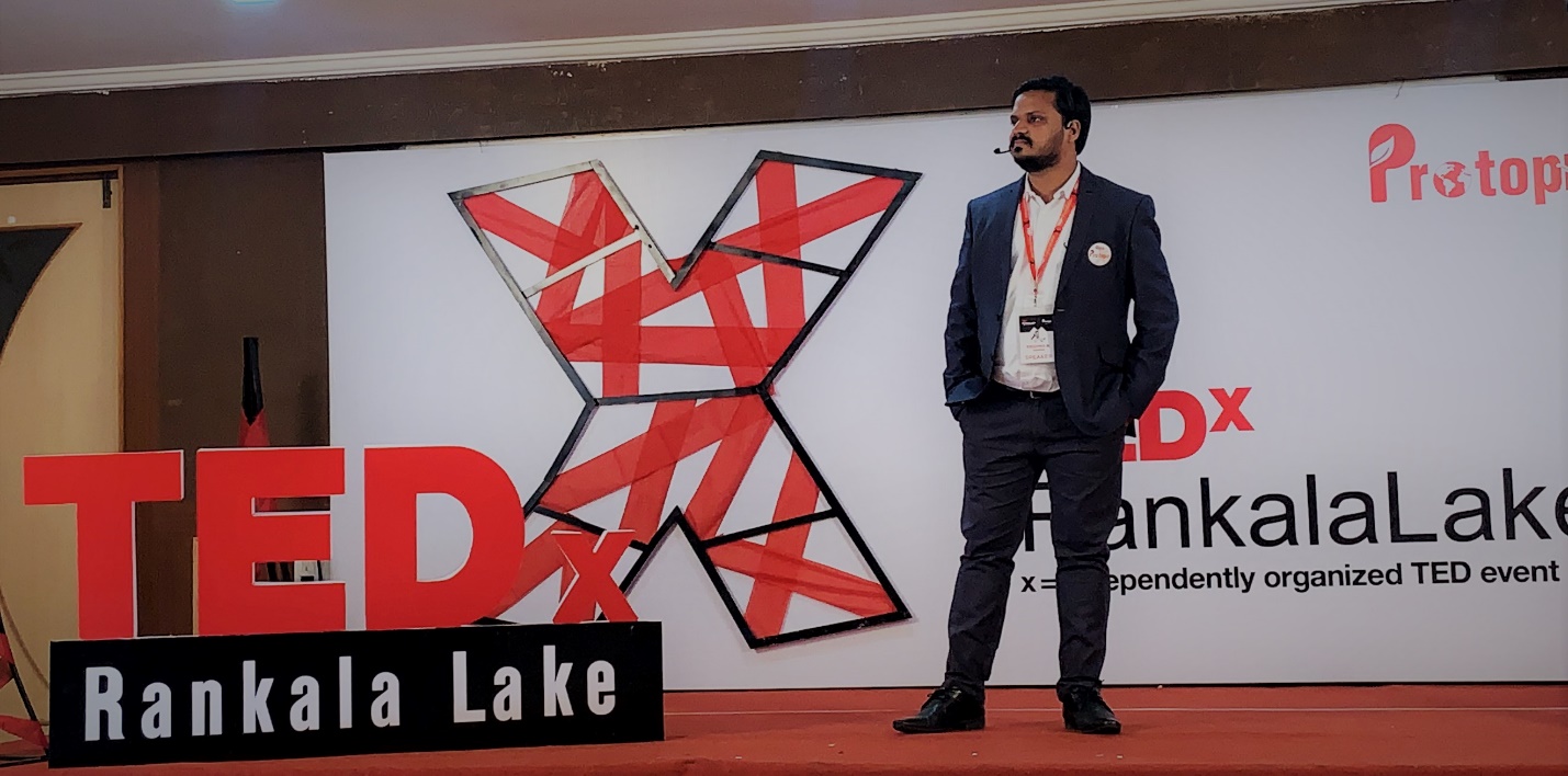 Dr Krishna N Sharma delivering a TEDx talk