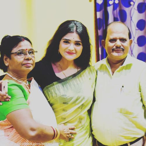Sritama Bhattacharjee with her parents