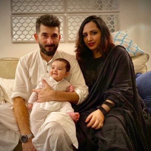 Behzaad Khan with his wife and son