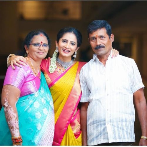 Sujatha P with her parents